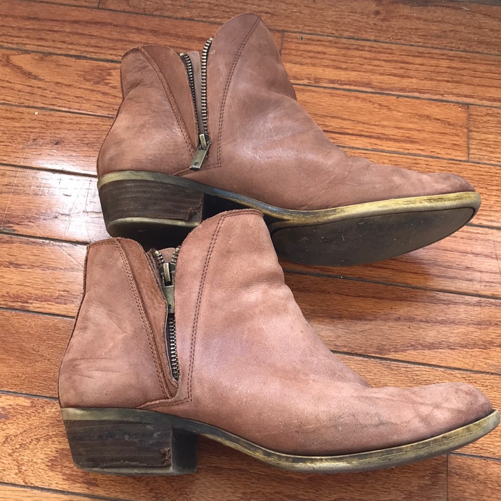 Lightly worn brown suede boots